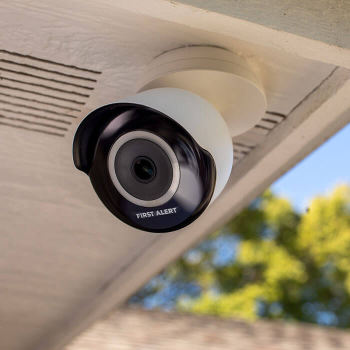 security camera mounted on home soffit